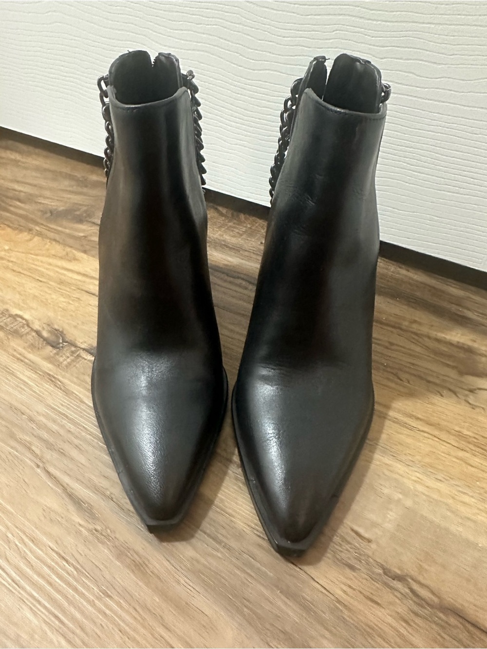 Vince Camuto Black Pointed Toe Ankle Booties with Back Chain Accent